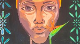 Detalle del rostro de una mujer pintado a manera de mural en la Casa de Integración Comunitaria de Esmeraldas, barrio 26 de Febrero.