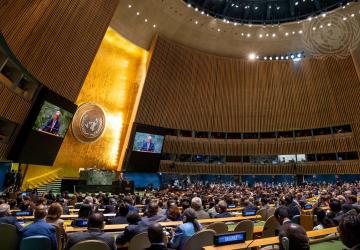 A scene of the general assembly hall with the Secretary-General speaks