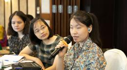 Banner shows Huong Dao Thu speaking into a microphone at a table with two women beside her.