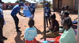 Community volunteers in Lusaka speaks to community members about COVID-19 as part of community sensitization on the virus. 