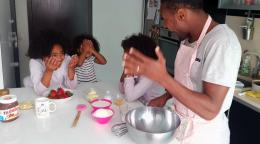 Blue Sharks Capitan , Marcos Soares cooks with young girls