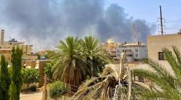 Picture of smoke fumes over buildings and trees in Khartoum