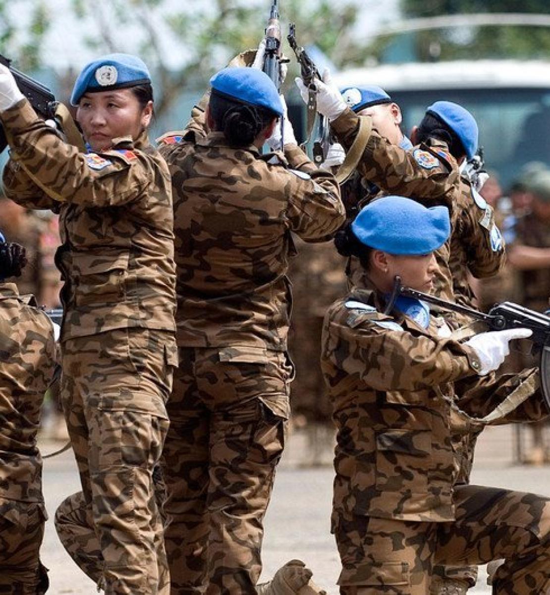 Mongolian peacekeepers serving in a guard unit assigned to protect the Special Court for Sierra Leone perform a tactical exercise.