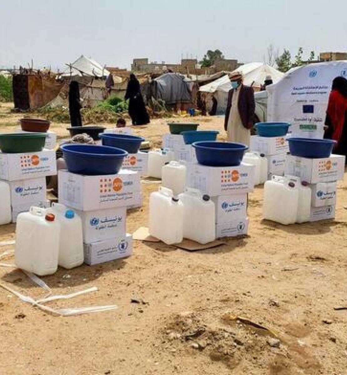 Distributions of kits containing basic health and hygiene items, clothes and ready-to-eat meals are set up for the flooding emergency relief effort in Al Jawf, Yemen. 