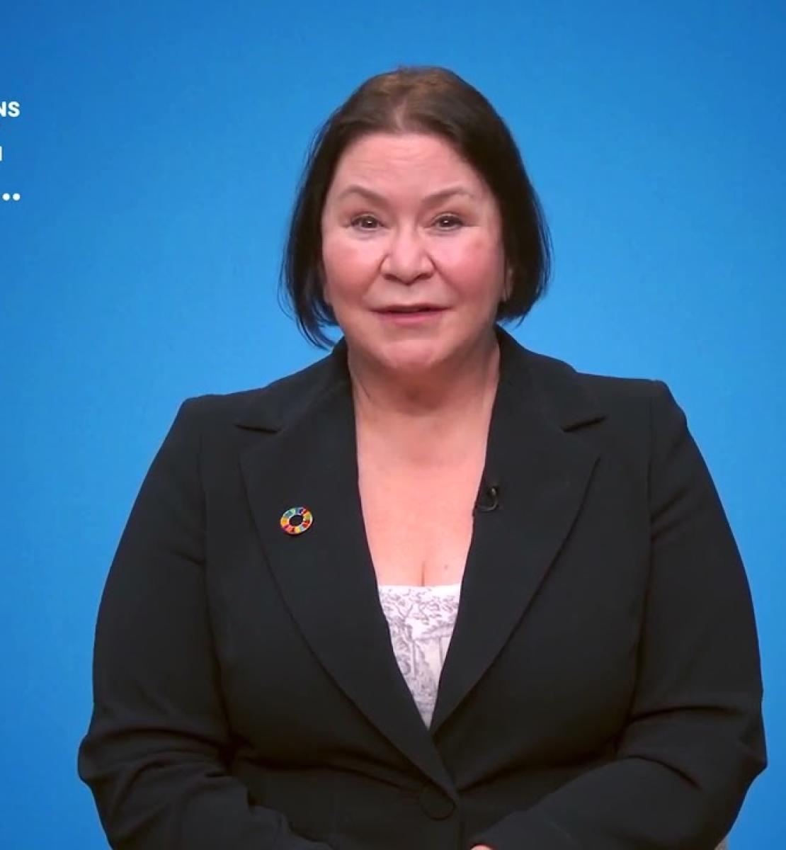 Screenshot from video message shows Resident Coordinator, Karla Robin Hershey