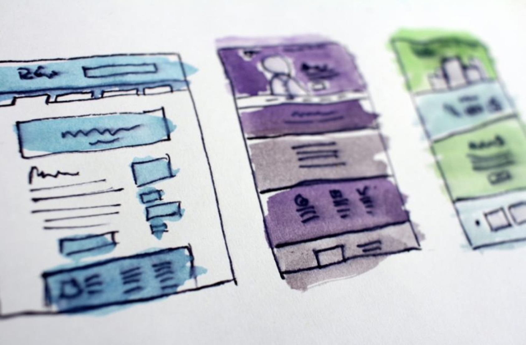 A drawing of three webpages in three different colors.