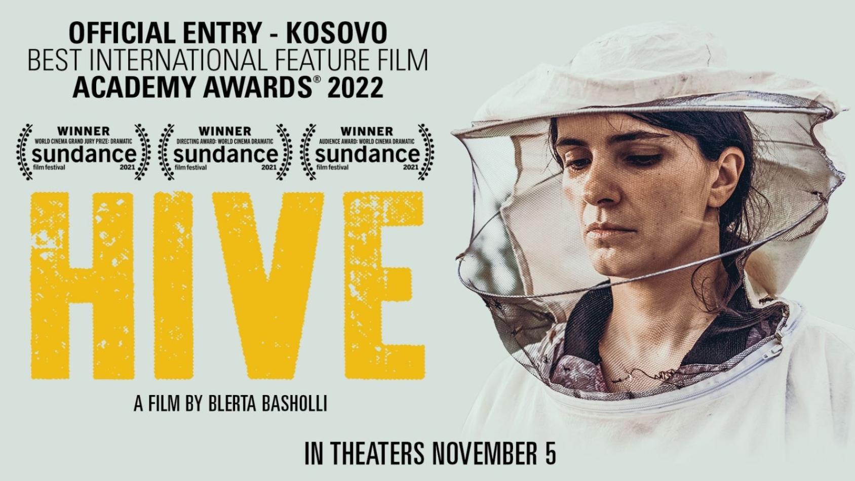 Hive poster showing the title in large letters to the left of an image of a woman wearing a beehive hat.