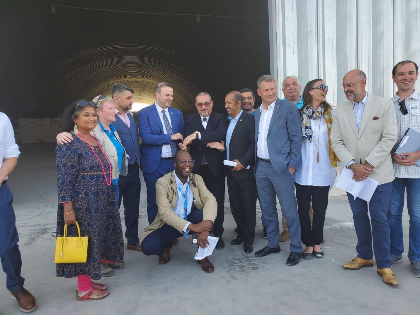 UN Resident and Humanitarian Coordinator for Afghanistan, Dr Ramiz Alakbarov, and the UN Resident Coordinator for Uzbekistan Ms. Roli Asthana meet with regional representatives from UNHCR, UNICEF and logistical officers from WFP at the Termez Regional Humanitarian Logistics Hub. 