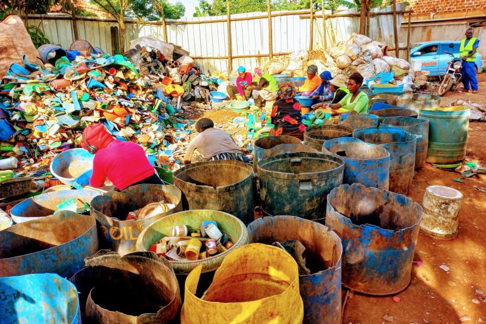 A group of women sorting waste.