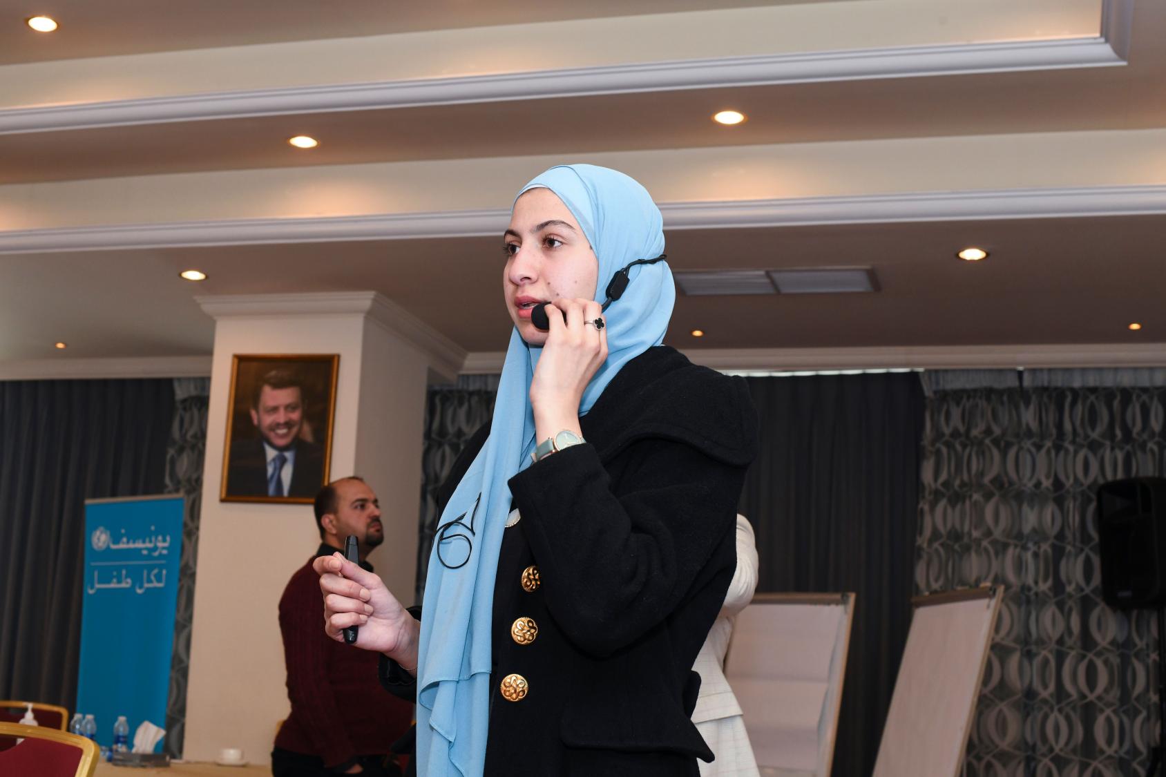 فاطمة، مشاركة في حدث ابتكار الشباب في مجال الأمن الغذائي الذي نظم من قبل اليونيسف وبرنامج الأغذية العالمي في الأردن.