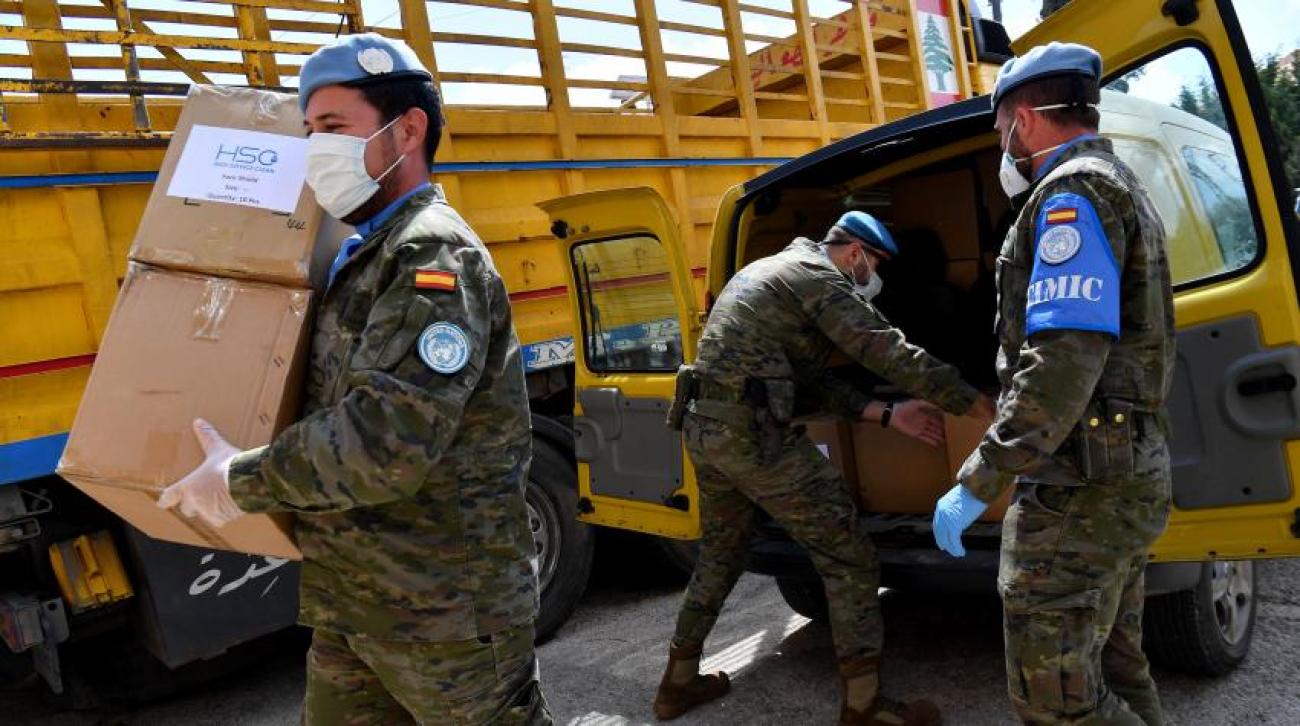 United Nations Interim Force in Lebanon unload a truck full of lifesaving supplies.