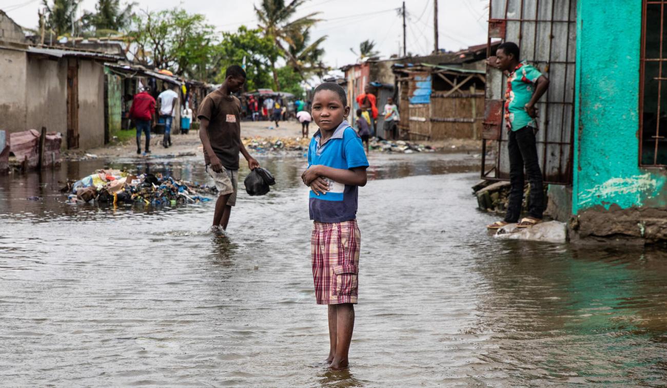 A child stands in rising water in the neighbourhood of Praia Nova in Beira, Mozambique. 