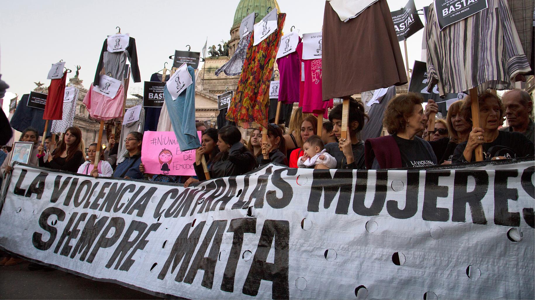 Image shows women marching on the street in protest to the femicide occurring in the country. 