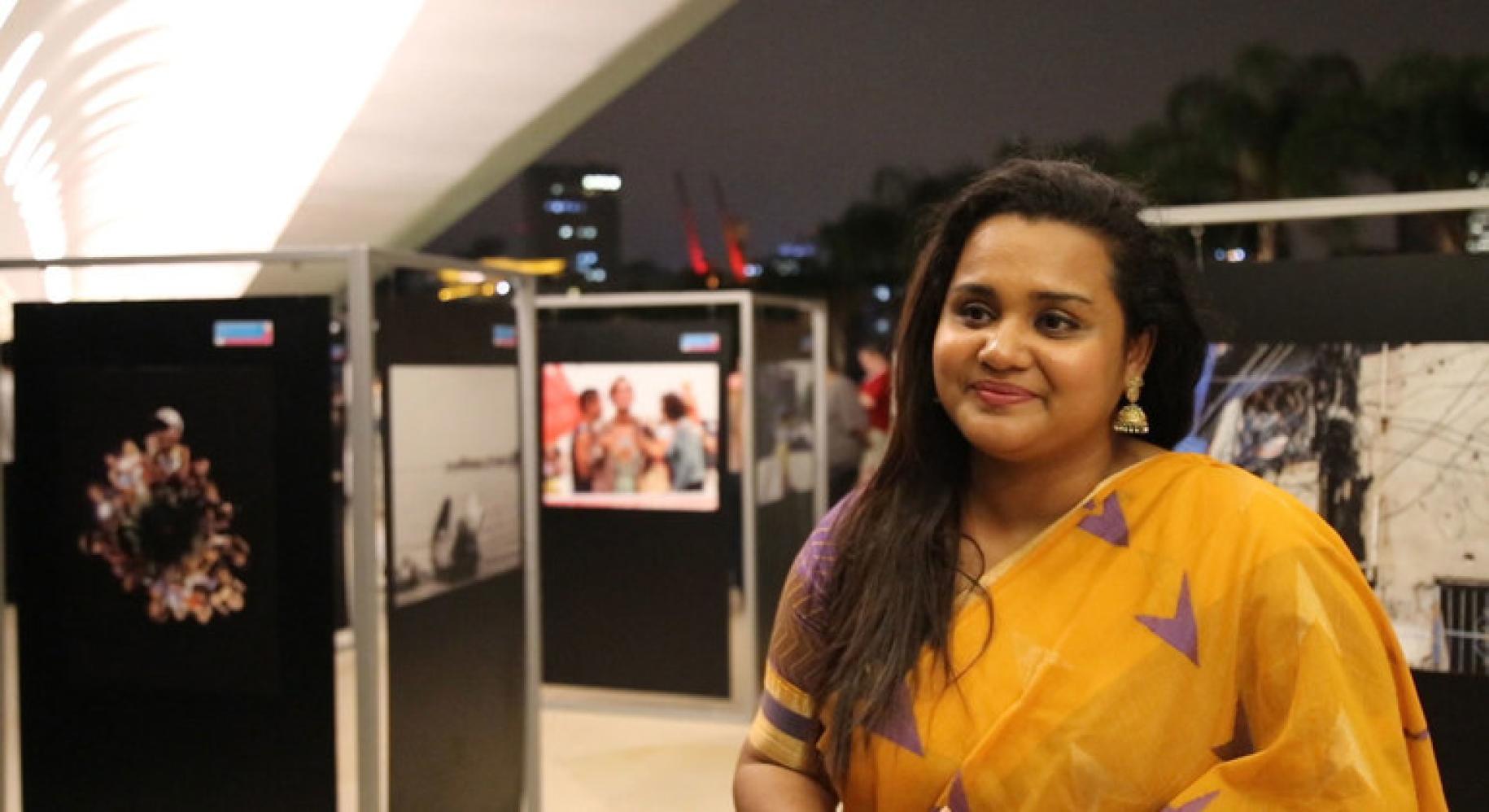 Jayathma Wickramanayake, the UN Secretary-General's Youth Envoy tours the exhibit.
