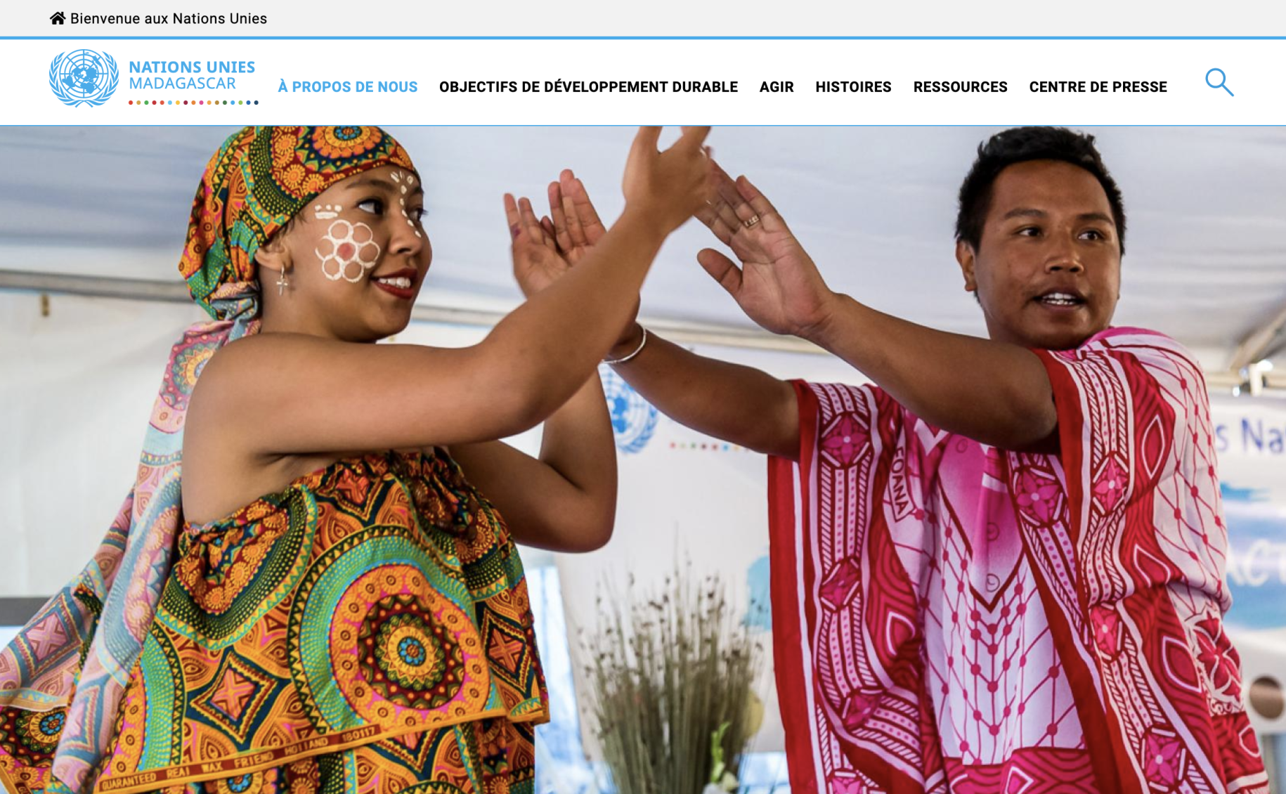 Screenshot of the UN in Madagascar section of their website, which shows a woman and man dressed in traditional garments performing.