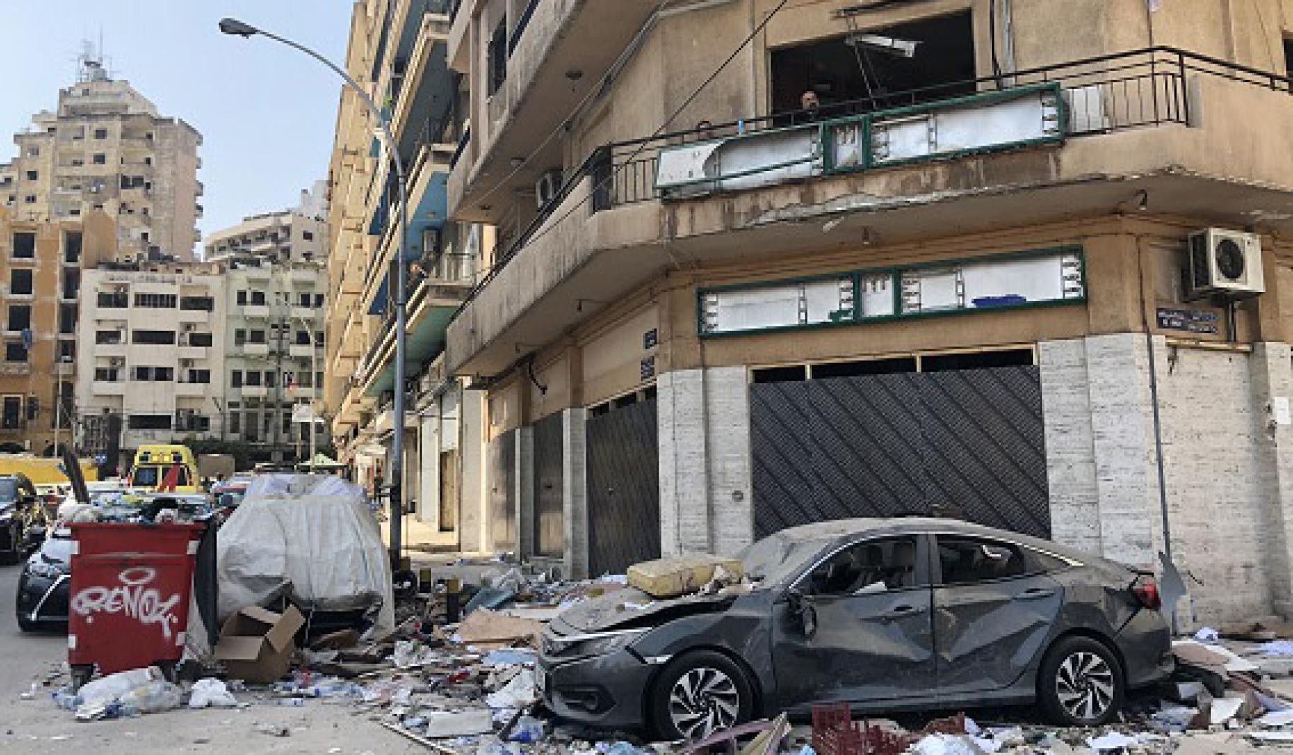 The photo depicts the immense physical damage the blast placed on the city. It shows destroyed cars, buildings and the streets of one of the neighbourhoods impacted.