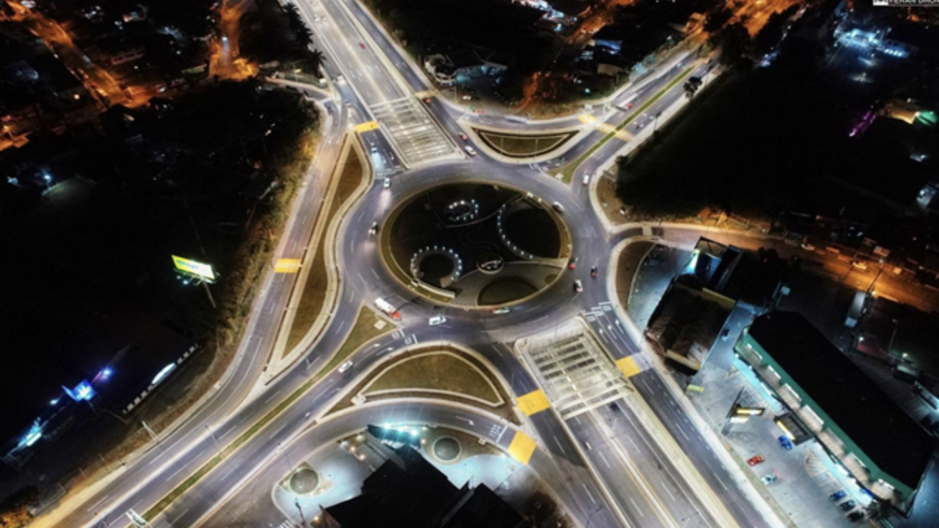 An areal view of a roundabout at night. 
