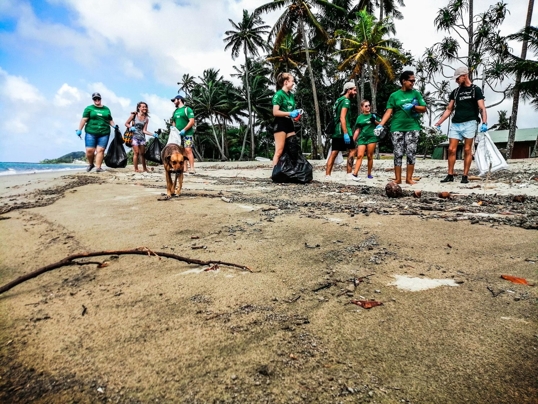 Youth participating in beach clean-up 