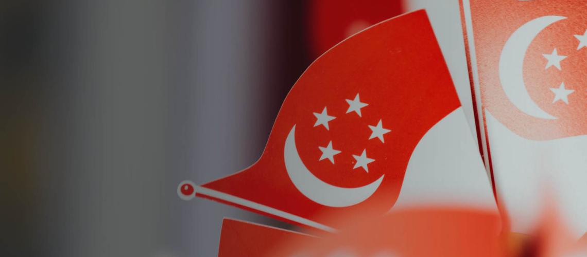 Close up of small Singapore flags.